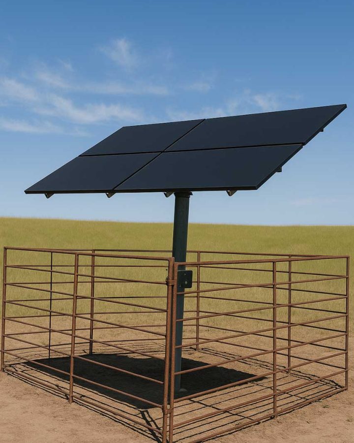 A single solar panel is attached to a metal pole within a rusted wire fence, standing out against a vast expanse of flat, golden terrain under a bright blue sky.