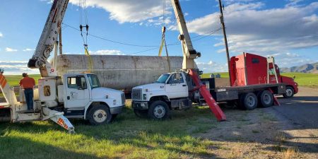Two well drilling trucks